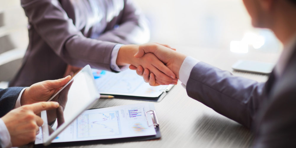 Business people shaking hands Business people shaking hands